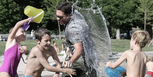 Man playing with his children